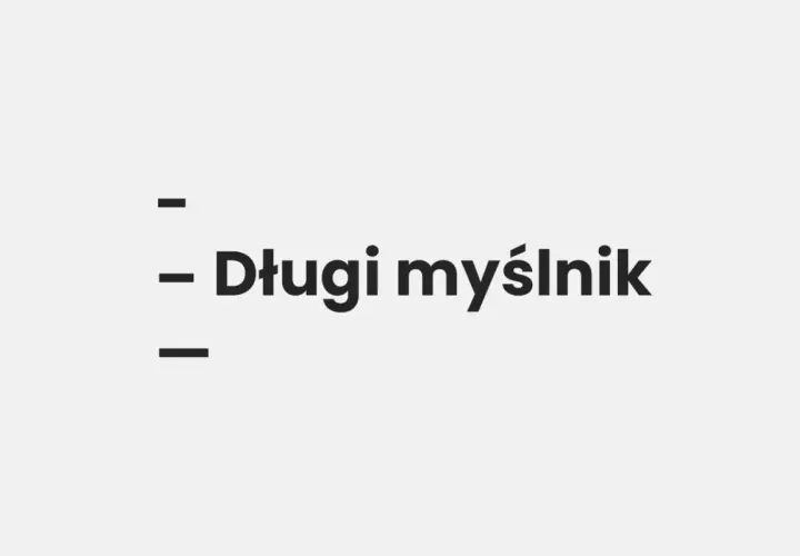 Trzy kreski, a między nimi tekst "Długi myślnik". Wygląda jak przykład półpauzy na klawiaturze.