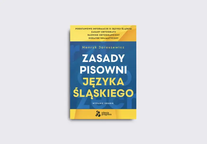 Okładka książki "Zasady pisowni języka śląskiego" Henryka Jaroszewicza. W tle subtelny ukośnik.